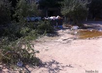 В Актау детская площадка соседствует с контейнером