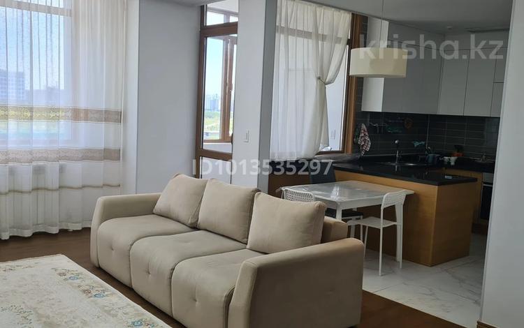 2-комнатная квартира · 76 м² · 5/21 этаж, Кабанбай батыра 43В за 350 000 ₸ в Астане, Есильский р-н — фото 2