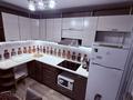 2-комнатная квартира · 52 м² · 4/9 этаж, 5-й мкр. 10 за 165 000 ₸ в Риддере — фото 5