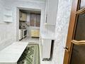 3-комнатная квартира · 70 м² · 2/5 этаж, 28-й мкр 22 за 25 млн ₸ в Актау — фото 8
