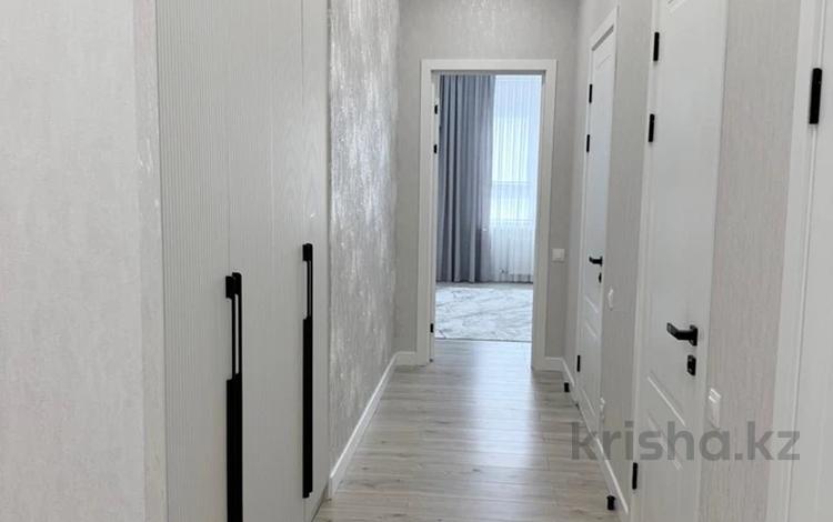 3-бөлмелі пәтер · 100 м² · 2/12 қабат, Кайыма Мухамедханова 6a, бағасы: 79 млн ₸ в Астане, Есильский р-н — фото 2