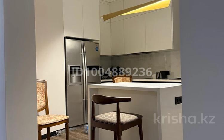 2-комнатная квартира · 69 м² · 13/17 этаж, Аль-Фараби 9 за 420 000 ₸ в Астане, Есильский р-н — фото 2