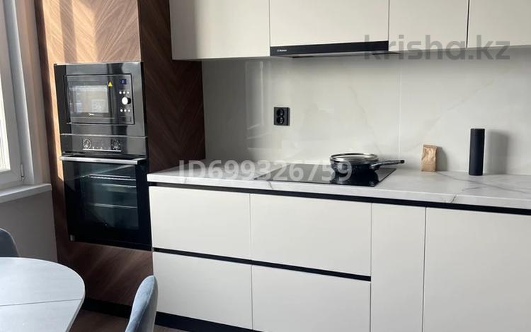 2-комнатная квартира · 62.65 м² · 11/14 этаж, мкр Уркер, Е-305 6 за 330 000 ₸ в Астане, Нура р-н — фото 2