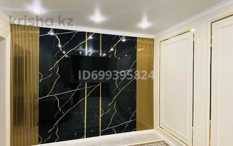 4-комнатная квартира · 77 м² · 2/5 этаж, 6 микрорайон 9 за 18.5 млн ₸ в Жанатасе — фото 2