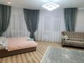 1-комнатная квартира, 70 м², 11 этаж посуточно, Розыбакиева 247 — Левитана за 20 000 〒 в Алматы — фото 11