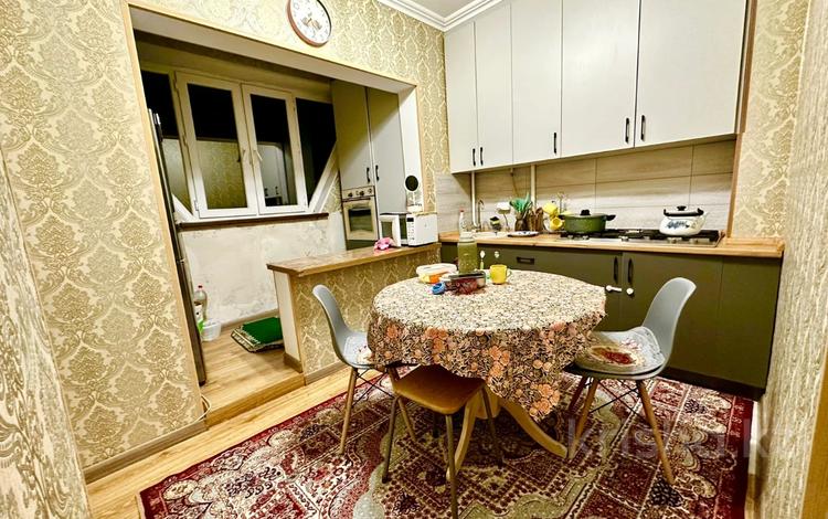 2-комнатная квартира, 60.9 м², 5/9 этаж, мкр Аксай-2 за 35 млн 〒 в Алматы, Ауэзовский р-н — фото 12