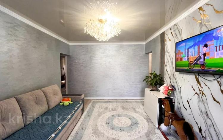 4-комнатная квартира · 77 м² · 1/5 этаж, мкр Гарышкер за 26 млн ₸ в Талдыкоргане — фото 11