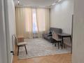3-комнатная квартира · 70 м² · 10/12 этаж, Аль Фараби 7 за 400 000 ₸ в Астане, Есильский р-н — фото 2