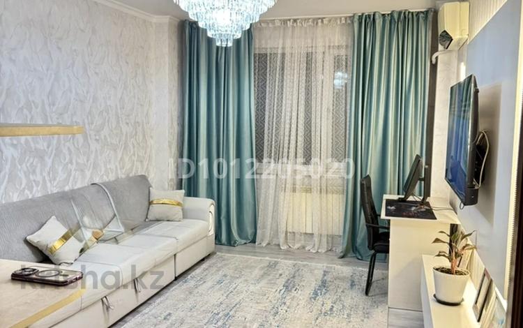 2-бөлмелі пәтер · 59 м² · 4/9 қабат, мкр Аксай-3А 91, бағасы: 40 млн ₸ в Алматы, Ауэзовский р-н — фото 2