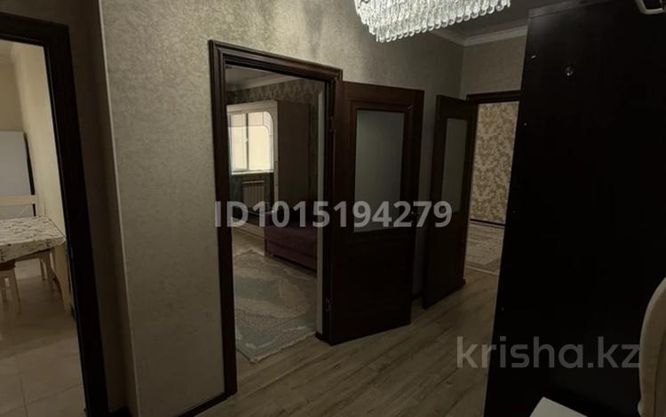 2-комнатная квартира · 67 м² · 6/9 этаж, мкр Нурсая, Таумуш Жумагалиев 15 за 250 000 ₸ в Атырау — фото 2