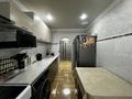 3-бөлмелі пәтер · 57.2 м² · 5/5 қабат, Майкудук, Мкр Восток-1 3, бағасы: 22.9 млн ₸ в Караганде, Алихана Бокейханова р-н — фото 24