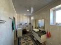 Отдельный дом · 7 комнат · 272.1 м² · 11.46 сот., мкр Оркен, Сатан Шореев 20 за 55 млн 〒 в Атырау — фото 15