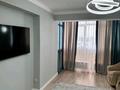 2-комнатная квартира · 68.2 м² · 5/10 этаж, Толе би 285/8 за 49 млн ₸ в Алматы, Ауэзовский р-н — фото 9