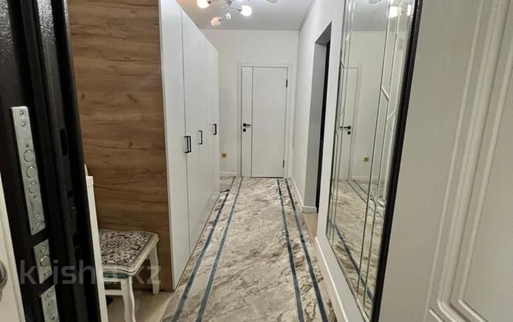 4-комнатная квартира · 102 м² · 9/9 этаж, мкр Аксай-1А за 55 млн ₸ в Алматы, Ауэзовский р-н — фото 2