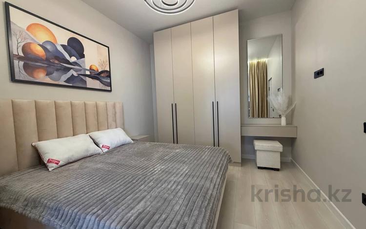 2-комнатная квартира · 55 м² · 6/18 этаж, Гагарина 310 за 450 000 ₸ в Алматы, Бостандыкский р-н — фото 2