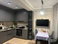 2-бөлмелі пәтер · 70 м² · 10/13 қабат, мкр Аксай-5, Садвакасова 3б — Пересечение улиц Момыш Улы и Жубанова, бағасы: 59 млн ₸ в Алматы, Ауэзовский р-н — фото 2