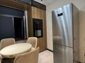 2-комнатная квартира · 60 м² · 9/18 этаж, Розыбакиева 197/2 за 550 000 ₸ в Алматы, Бостандыкский р-н — фото 2