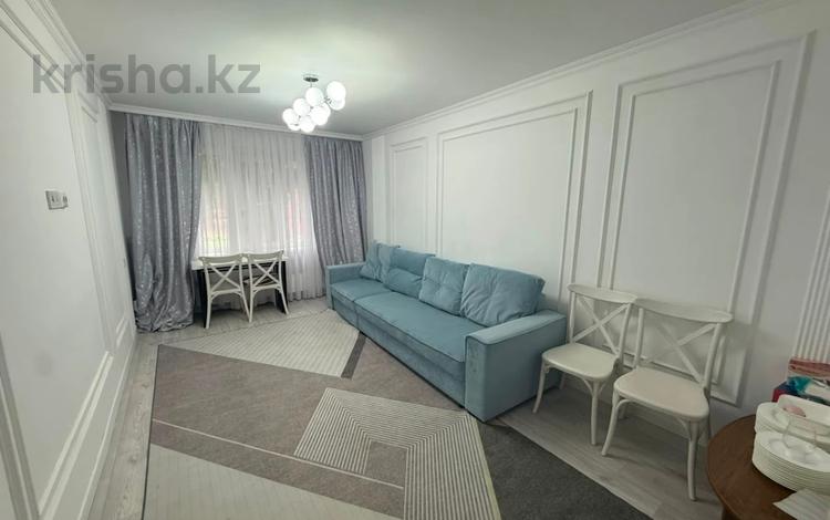 2-комнатная квартира · 52 м² · 2/5 этаж, мкр Аксай-4 за 44 млн ₸ в Алматы, Ауэзовский р-н — фото 5