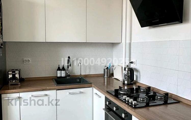 2-комнатная квартира · 57 м² · 3/9 этаж, 4 микрорайон 33 за 24 млн ₸ в Аксае — фото 2