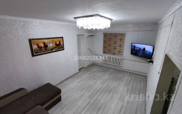 4-комнатная квартира, 80 м², 5/5 этаж, Сатангулов 3 микрорайон за 11 млн 〒 в Кульсары — фото 2