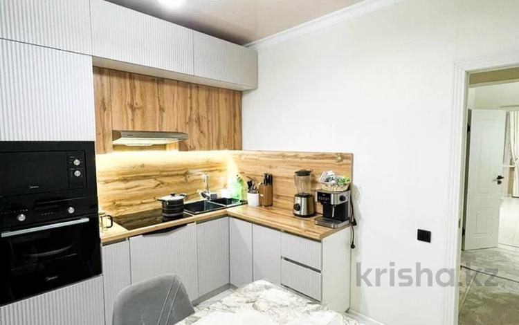 2-комнатная квартира · 57 м² · 3/12 этаж, Коктем за 27.5 млн ₸ в Талдыкоргане, мкр Коктем — фото 2