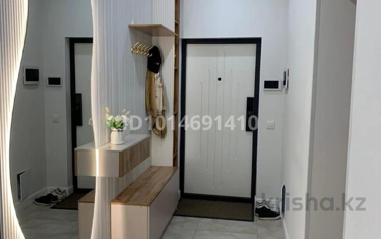 2-комнатная квартира · 69.2 м² · 4/12 этаж, Ахмет Байтурсынулы 18 — 2 подъезд, возле магазина Наурыз за 43.5 млн ₸ в Астане, Алматы р-н — фото 2