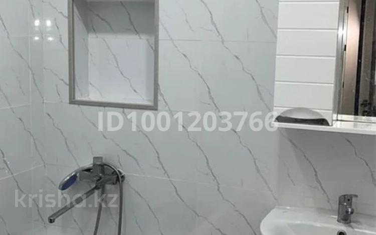 2-комнатная квартира · 56 м² · 1/4 этаж, 5 71 за 15.5 млн 〒 в Жанаозен — фото 6