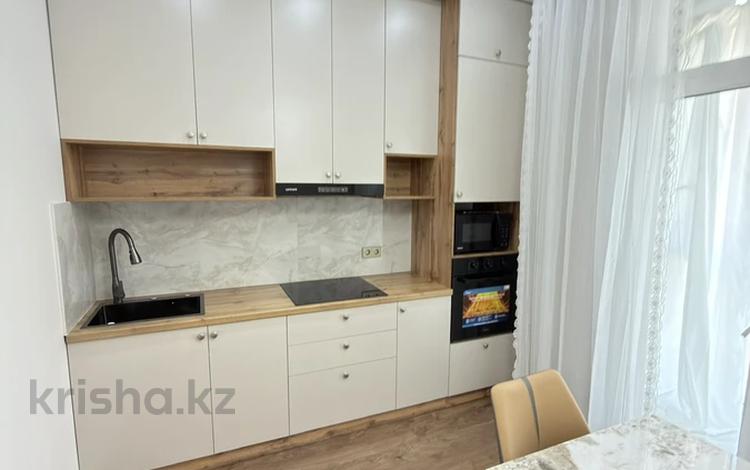 1-комнатная квартира · 40 м² · 8/9 этаж, мкр Нуркент, Турара Рыскулова 2Б/1 — Момышулы за 34 млн ₸ в Алматы, Алатауский р-н — фото 2