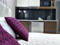 1-комнатная квартира · 50 м² · 1/12 этаж, 17-й мкр 46 — C видом на двор за 12 000 ₸ в Актау — фото 2