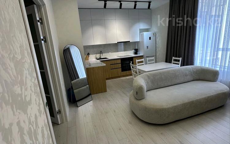 2-комнатная квартира · 52 м² · 7/12 этаж, Жарбосынова 69 за 450 000 ₸ в Атырау — фото 2