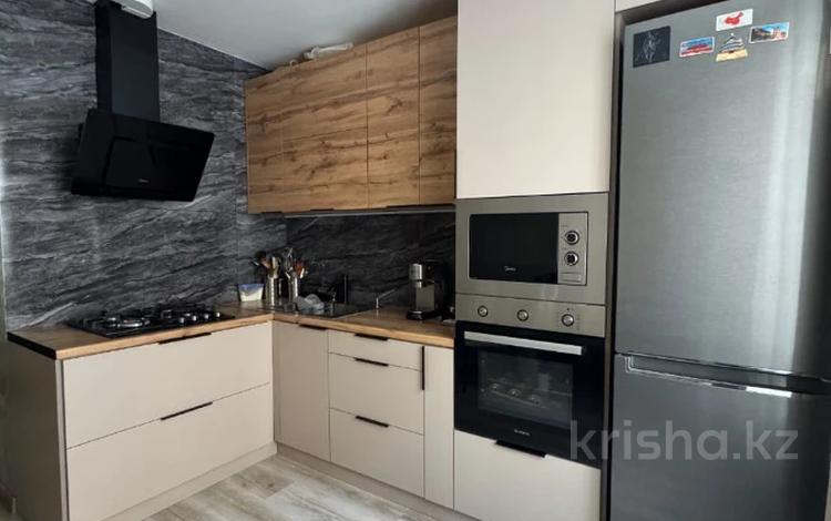 3-комнатная квартира · 75 м² · 1/5 этаж, мкр Аксай-3Б за 40 млн ₸ в Алматы, Ауэзовский р-н — фото 5