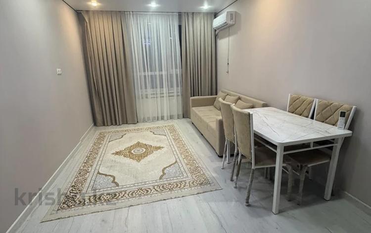 2-комнатная квартира · 42 м² · 5/12 этаж, Байдибек би 115/10 за 200 000 ₸ в Шымкенте, Абайский р-н — фото 2