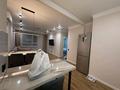 2-комнатная квартира · 55 м² · 14/18 этаж, Утепова за 46 млн ₸ в Алматы, Бостандыкский р-н — фото 4