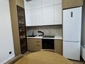 2-комнатная квартира · 52 м² · 8/12 этаж, Е-899 1 за 300 000 ₸ в Астане, Есильский р-н — фото 2