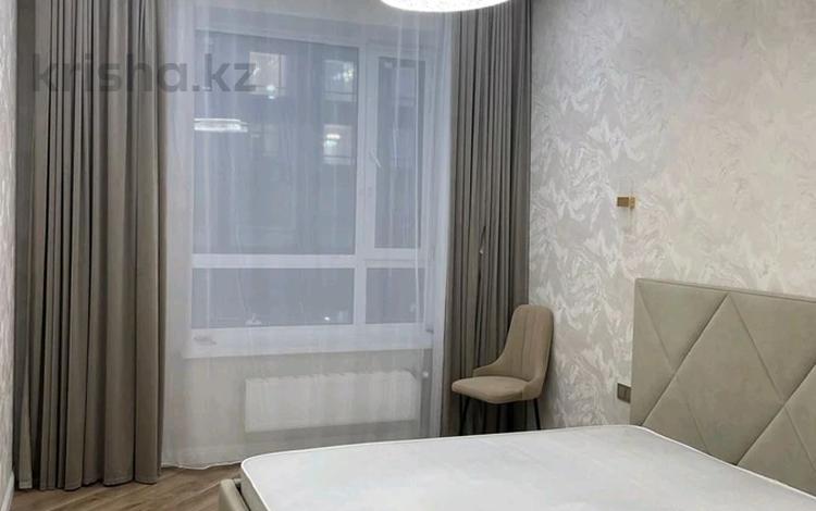 2-комнатная квартира · 65 м² · 5/12 этаж, Аль Фараби 5 за 400 000 ₸ в Астане, Есильский р-н — фото 2