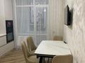 2-комнатная квартира · 65 м² · 5/12 этаж, Аль Фараби 5 за 400 000 ₸ в Астане, Есильский р-н — фото 9