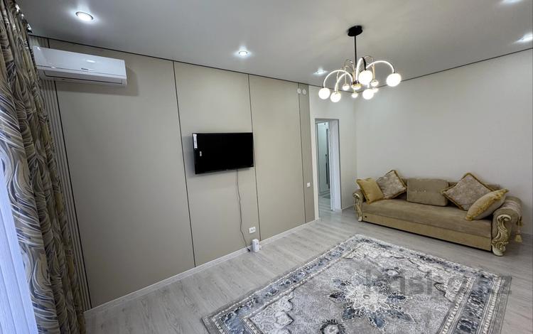 2-комнатная квартира · 62 м² · 9/12 этаж, 189 квартал уч 188/1 за 230 000 ₸ в Шымкенте, Абайский р-н — фото 2