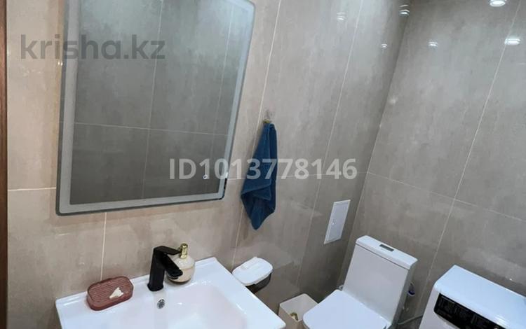 2-комнатная квартира · 74 м² · 7/12 этаж, Сыганак 13 за 330 000 ₸ в Астане, Нура р-н — фото 2