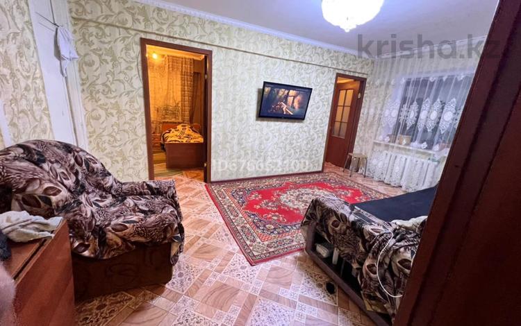 4-комнатная квартира, 63 м², 4/5 этаж, Мухамеджанова 5 за 15.5 млн 〒 в Балхаше — фото 2
