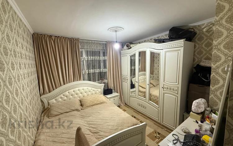 2-комнатная квартира · 55 м² · 5/9 этаж, мкр Аксай-1А 26 за 39 млн ₸ в Алматы, Ауэзовский р-н — фото 6
