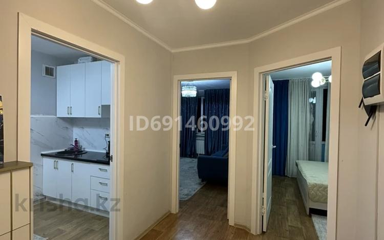 2-комнатная квартира · 54.8 м² · 7/9 этаж, Б. Момышулы 5/6 за 35 млн 〒 в Алматы, Алатауский р-н — фото 2