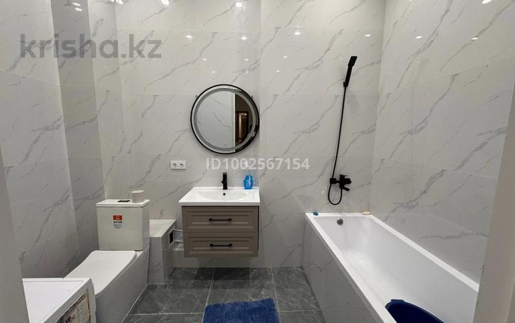 2-комнатная квартира · 52 м² · 1 этаж, Жубан Молдагалиев 5 за 240 000 〒 в Астане, Нура р-н — фото 2