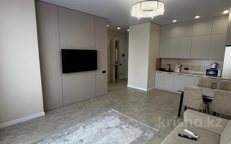 2-комнатная квартира · 55 м² · 13/16 этаж, Достык 8/4 за 350 000 ₸ в Астане, Есильский р-н — фото 2
