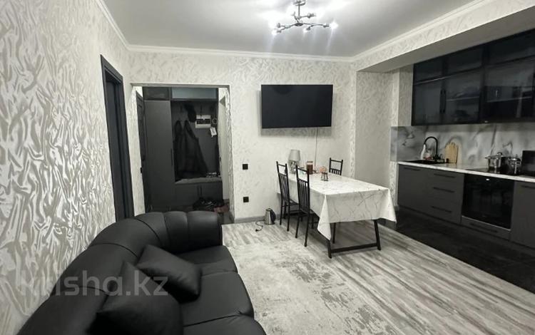 2-комнатная квартира · 55 м² · 2/13 этаж, мкр Тастак-2, Толе би 189/3 за 43.5 млн ₸ в Алматы, Алмалинский р-н — фото 2