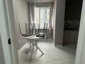 1-комнатная квартира · 40 м² · 4/5 этаж, Микрорайон 4 61/1 за 10 000 〒 в Конаеве — фото 9