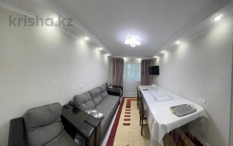 4-комнатная квартира, 76 м², 3/5 этаж, Каратау за 25 млн 〒 в Таразе — фото 2