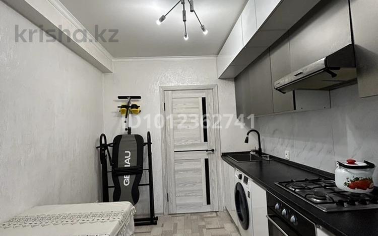 2 комнаты · 52 м² · 2/5 этаж, мкр Таугуль, Жандосова 162а 162а за 70 000 ₸ в Алматы, Ауэзовский р-н — фото 2
