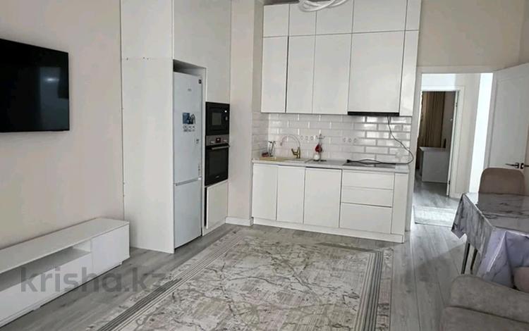 2-комнатная квартира · 57 м² · 1 этаж, Бокейхана 25 за 300 000 ₸ в Астане, Есильский р-н — фото 2