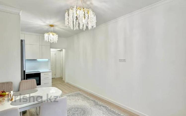 2-комнатная квартира · 52 м² · 5/16 этаж, торайгырова 19а за 52 млн ₸ в Алматы, Бостандыкский р-н — фото 8