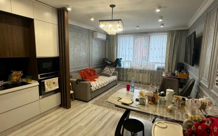 3-комнатная квартира · 80 м² · 2/12 этаж, мкр Таугуль, Мустай Карим за 71 млн ₸ в Алматы, Ауэзовский р-н — фото 2